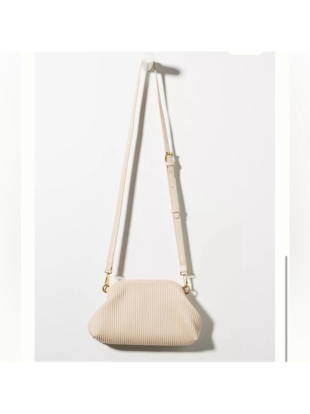 Anthropologie faux leather clamshell clutch cream